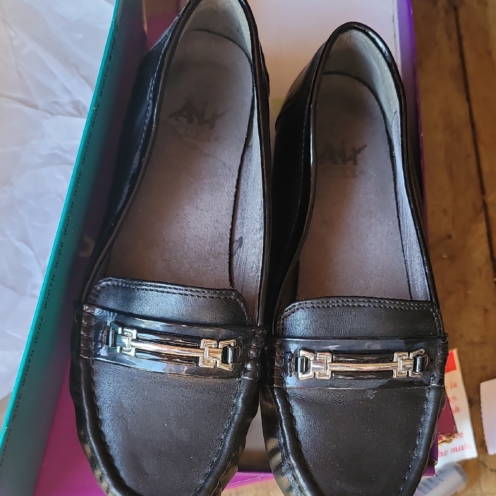 Stylish Black Loafers with Silver Detail